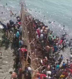 Ceuta Border Crisis unfolds with 34 Dead as Thousands Cross From Morocco.
