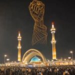 A giant clenched-fist monument displayed during Ayatollah Ali Khamenei's state funeral in Tehran, symbolising Iran's message of defiance and continuity.
