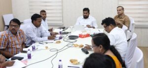 Odisha education department officials hold a review meeting.