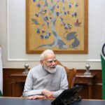 PM Narendra Modi as he speaks on phone in his office in New Delhi.
