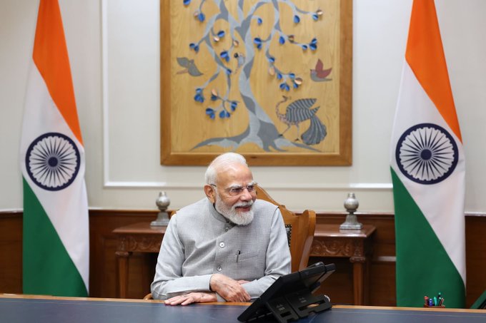 PM Narendra Modi as he speaks on phone in his office in New Delhi.
