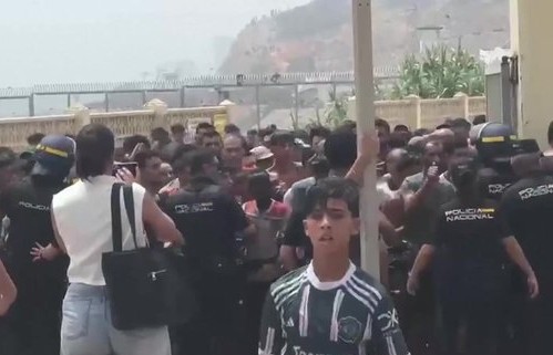 Hundreds of migrants entering Ceuta, Spain's autonomous city on Morocco's northern coast.