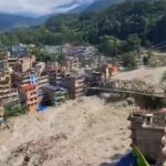 Massive flash flood strikes Nepal, leaving hundreds missing and buildings swept away.