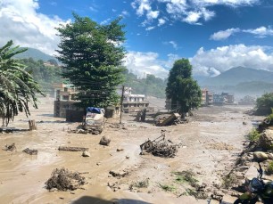 Nepal flash flood ravaged scores of villages.