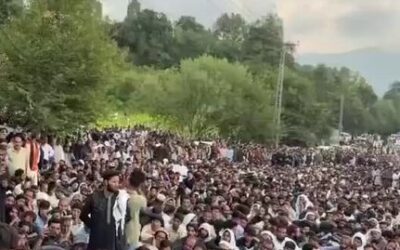 Security personnel stand guard amid protests and election-related unrest in Pakistan-occupied Kashmir.