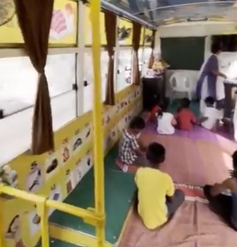 Ahmedabad Signal School mobile bus providing education to children.