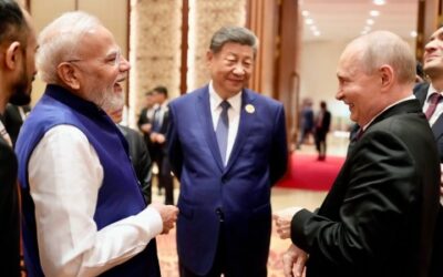 Narendra Modi, Xi Jinping and Vladimir Putin pose for a family photo at the BRICS Summit 2026 in New Delhi.