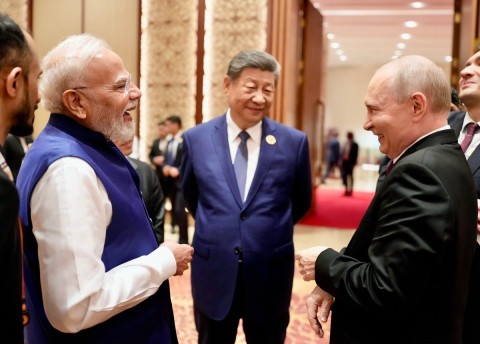 Narendra Modi, Xi Jinping and Vladimir Putin pose for a family photo at the BRICS Summit 2026 in New Delhi.