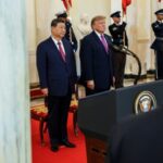 US President Trump and Chinese President Xi Jinping shaking hands during Xi’s Washington state visit.