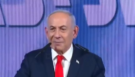 Benjamin Netanyahu addresses supporters at a convention centre in Jerusalem on election night.