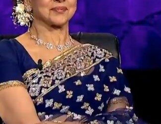 Hema Malini on the set of KBC hosted by Amitabh Bachchan.