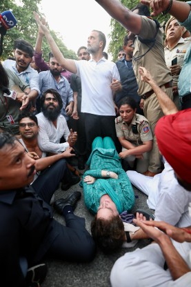 INDIA bloc MPs led by Rahul Gandhi stage a sit-in on a Delhi road after being stopped on the way to Jantar Mantar.