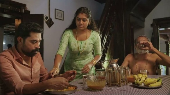 Nimisha Sajayan in a kitchen scene from The Great Indian Kitchen.